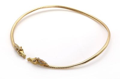 Lot 91 - An 18ct gold double horse head torque necklace