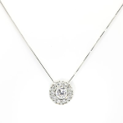 Lot 96 - A  white gold diamond set circular cluster pendant and chain