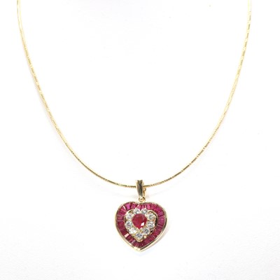 Lot 84 - A diamond and ruby heart pendant on a gas pipe circlet