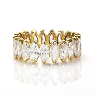 Lot 168 - An 18ct gold and marquise cut diamond full eternity ring