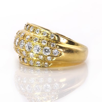 Lot 70 - An 18ct gold and diamond five row bombé ring, by Garrard & Co.
