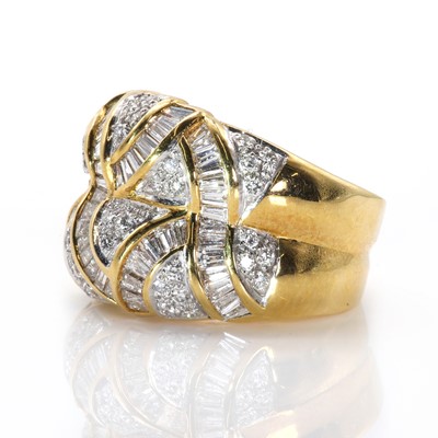 Lot 76 - A vari-cut diamond set two row bombé ring