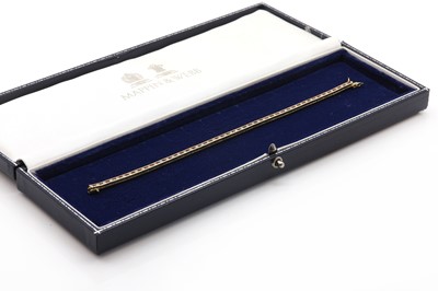 Lot 82 - A ruby and diamond bracelet in 18ct gold, by Mappin & Webb