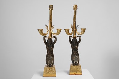 Lot 161 - A pair of Empire-style ormolu and patinated bronze table lamps