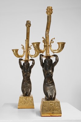 Lot 161 - A pair of Empire-style ormolu and patinated bronze table lamps