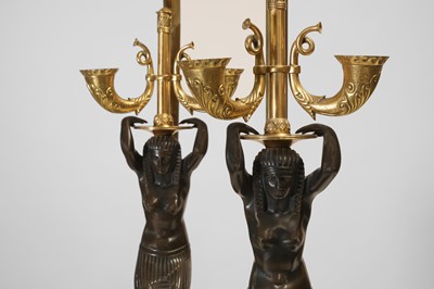 Lot 161 - A pair of Empire-style ormolu and patinated bronze table lamps