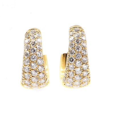 Lot 112 - A pair of 18ct gold diamond set tapered hoop earrings