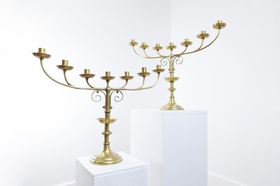 Lot 622 - A pair of Victorian brass seven-branch candelabra