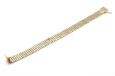 Lot 94 - A two colour gold brick link bracelet