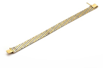 Lot 94 - A two colour gold brick link bracelet