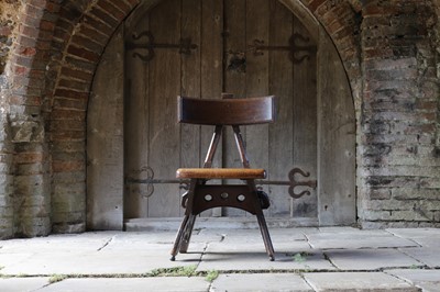 Lot 23 - A 'Granville' oak chair designed by E W Pugin