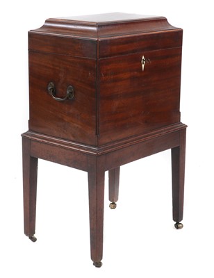 Lot 331 - A George III mahogany cellarette and stand