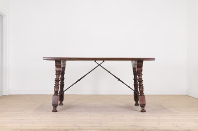 Lot 405 - A walnut and iron centre table