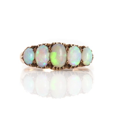 Lot 1028 - A five stone opal ring