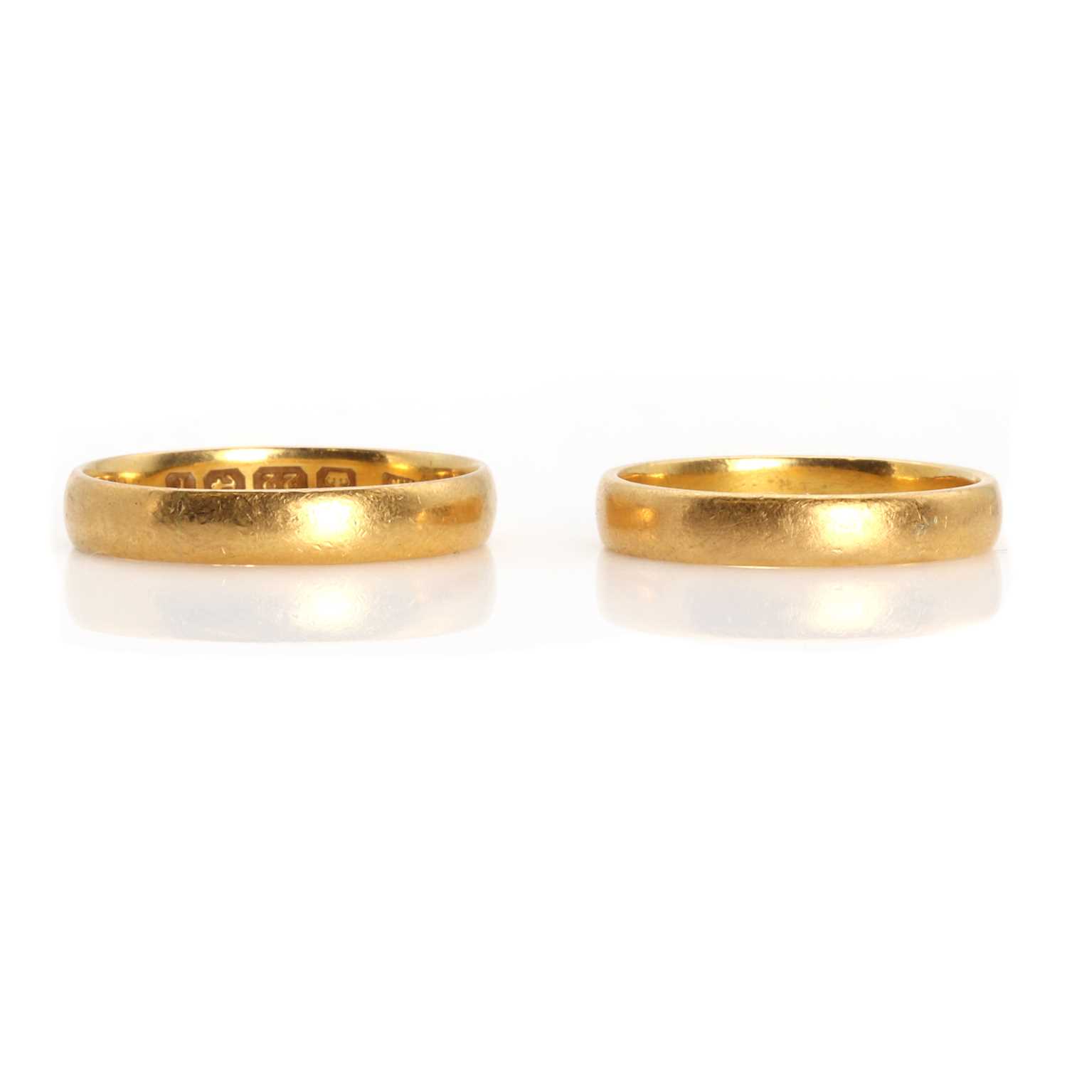 Lot 1245 - Two 22ct gold wedding bands