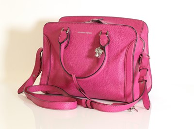 Lot 336 - An Alexander McQueen fuchsia pink pebbled calfskin tote