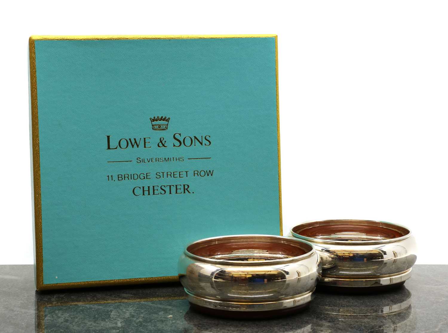 Lot 46 A pair of silver coasters