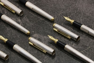 Lot 39 - A group of five silver fountain pens