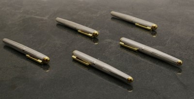 Lot 39 - A group of five silver fountain pens