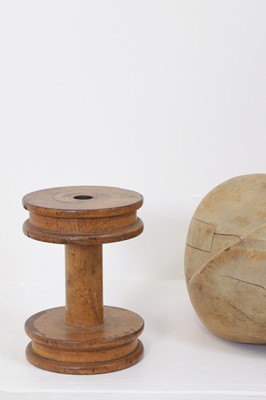 Lot 440 - A set of four fruitwood milliner's hat moulds