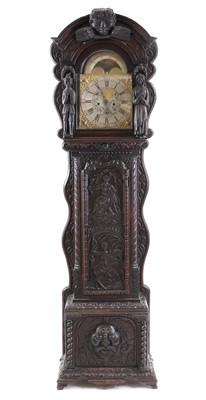Lot 468 - A carved oak longcase clock