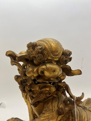 Lot 137 - A Chinese gilt wood carving