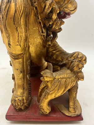 Lot 137 - A Chinese gilt wood carving