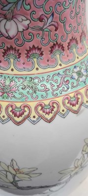 Lot 173 - A pair of Chinese famille rose vases