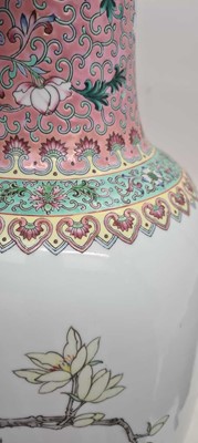 Lot 173 - A pair of Chinese famille rose vases