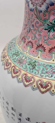 Lot 173 - A pair of Chinese famille rose vases