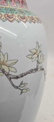 Lot 173 - A pair of Chinese famille rose vases