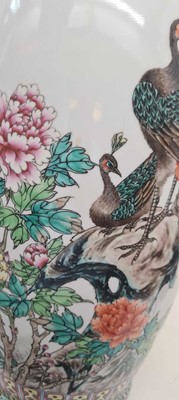 Lot 173 - A pair of Chinese famille rose vases