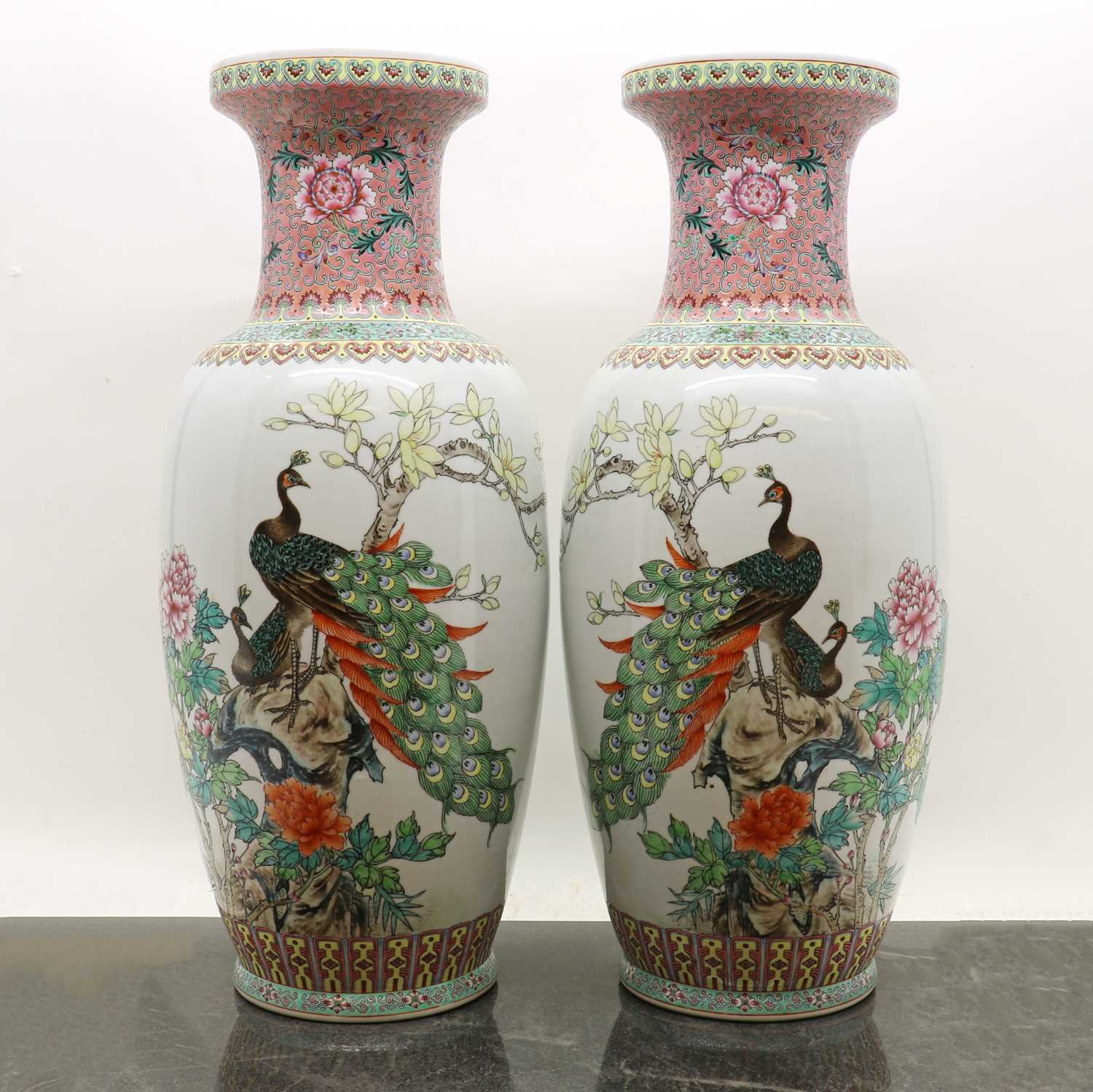 Lot 173 - A pair of Chinese famille rose vases