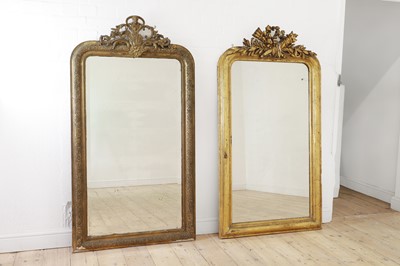 Lot 104 - A near pair of giltwood and gesso overmantel mirrors