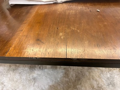 Lot 105 - A walnut and steel coffee table by Rose Uniacke