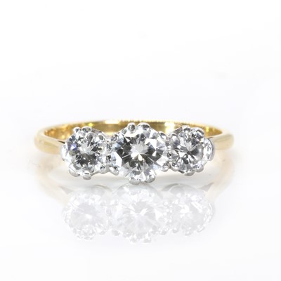 Lot 234 - A graduated diamond three stone ring