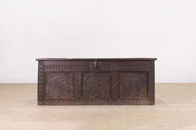 Lot 378 - A James I carved oak chest