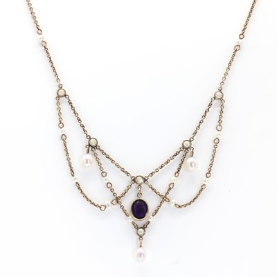Lot 30 - A 9ct gold seed pearl and amethyst festoon necklace