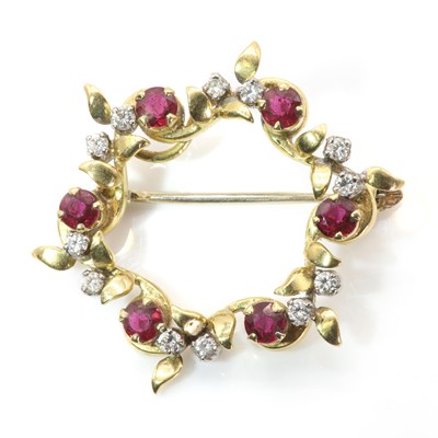 Lot 78 - An 18ct gold ruby and diamond openwork brooch