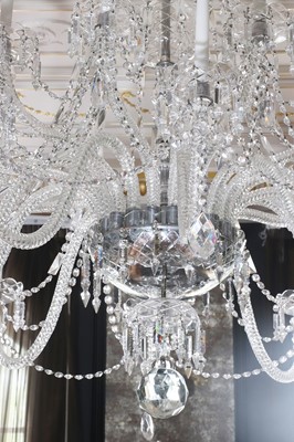 Lot 493 - A cut and moulded crystal glass twenty-light chandelier in the manner of Baccarat