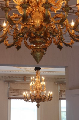 Lot 496 - A pair of Louis XV-style ormolu thirty-three-light chandeliers