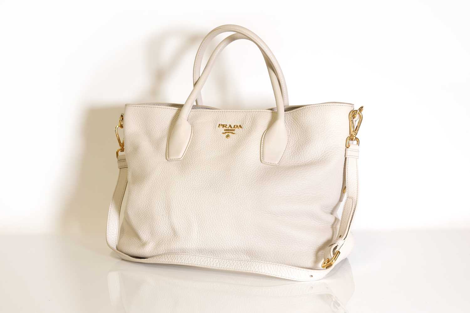 Lot 325 - A Prada cream leather shopper tote