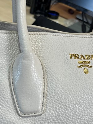 Lot 325 - A Prada cream leather shopper tote