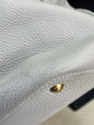 Lot 325 - A Prada cream leather shopper tote