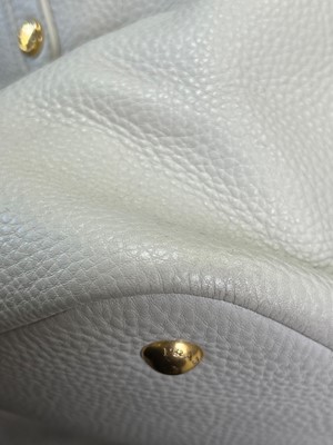 Lot 325 - A Prada cream leather shopper tote