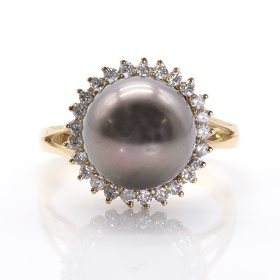 Lot 206 - A Tahitian cultured pearl and diamond cluster ring