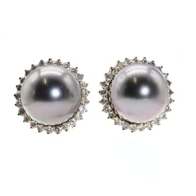 Lot 207 - A pair of cultured Tahitian pearl and diamond earrings