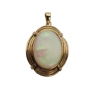 Lot 1179 - A gold single stone opal pendant