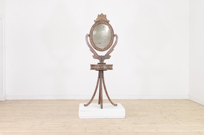Lot 304 - A bone and ivory inlaid teak dressing mirror