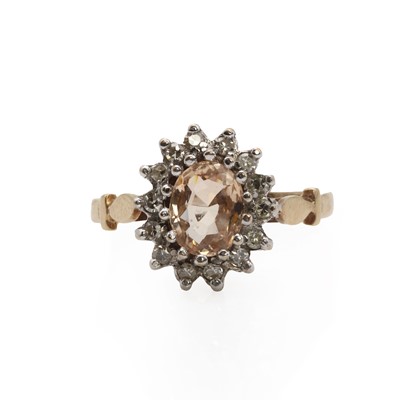 Lot 1108 - A 9ct gold morganite and diamond cluster ring